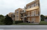 Moderne Wohnanlage mit Holz- und Putzfassade_3